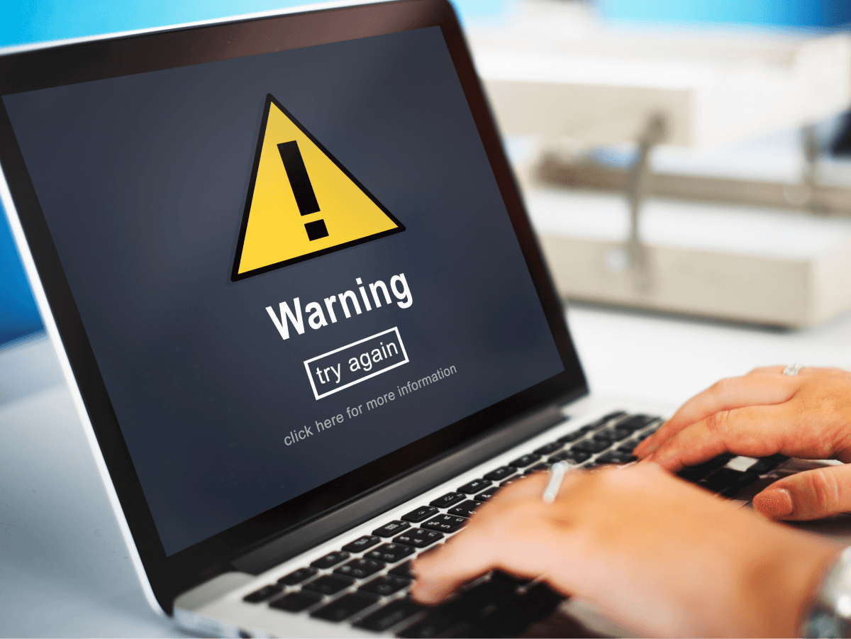 Computer screen that says "Warning, try again."