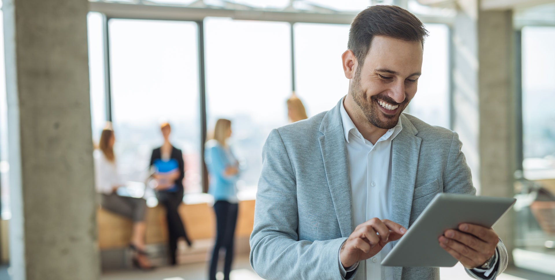 businessmanholdingipad.jpg Infinium Business Internet Plans